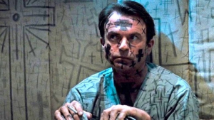 Sam Neill como John Trent